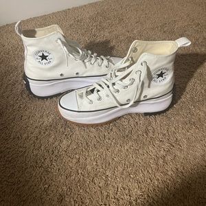 Gently worn platform converse sneakers with a few wear marks shown in photos
